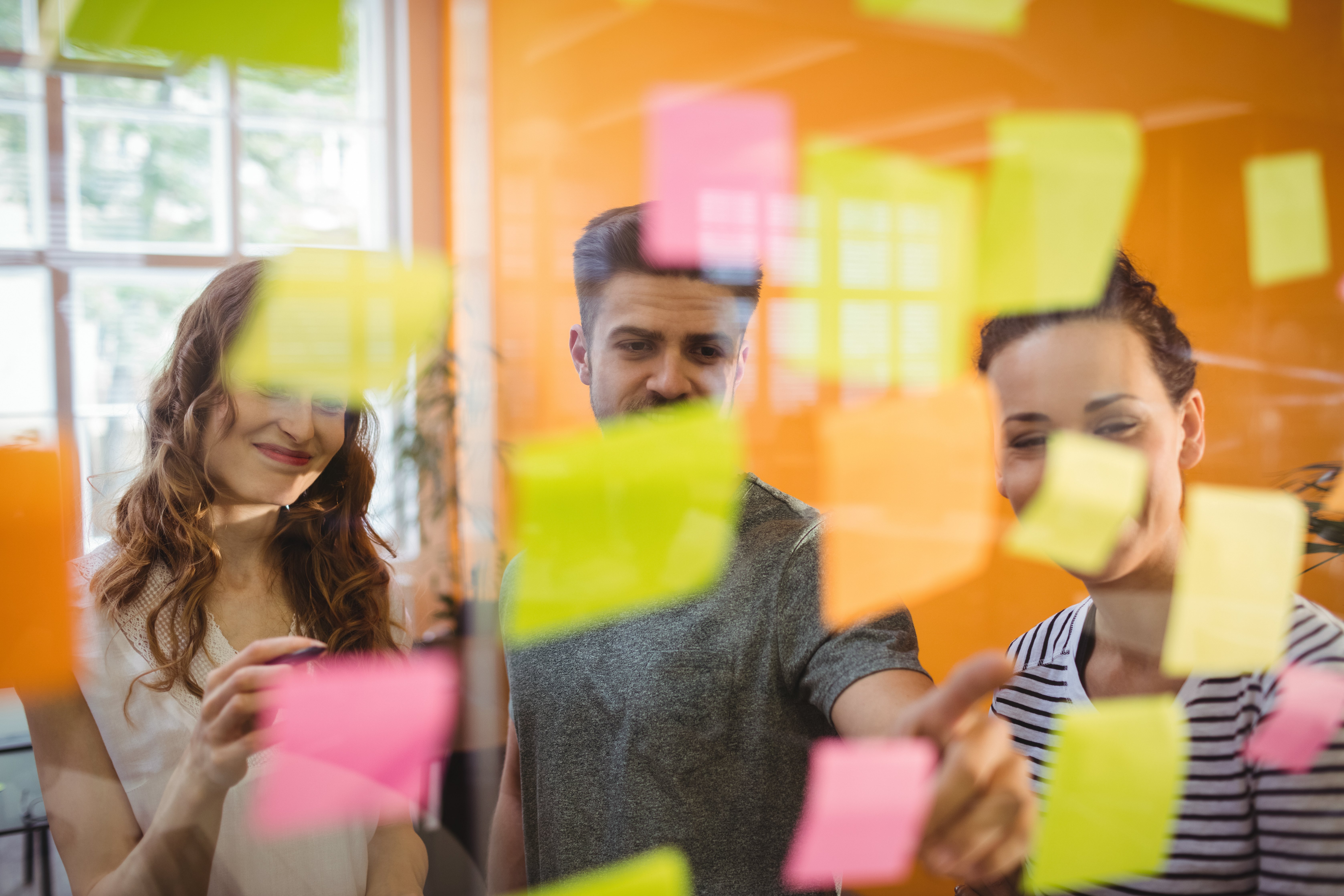 business-executives-reading-sticky-notes-1